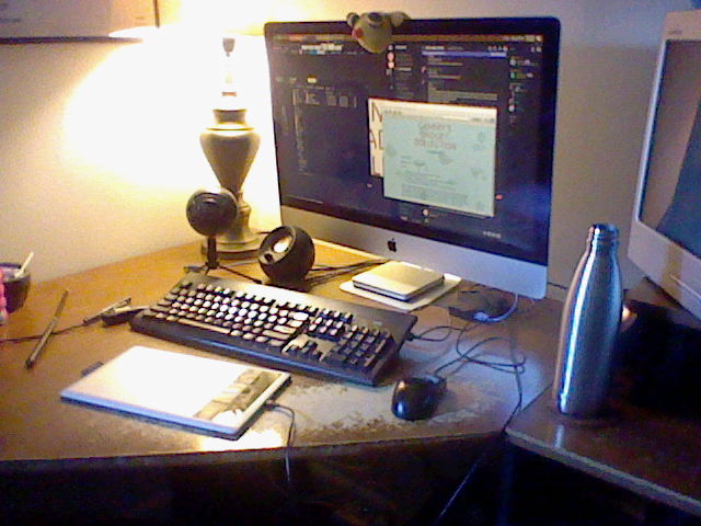 My desk with a 2013 iMac on it, plus a Blue Snowball and a Wacom tablet