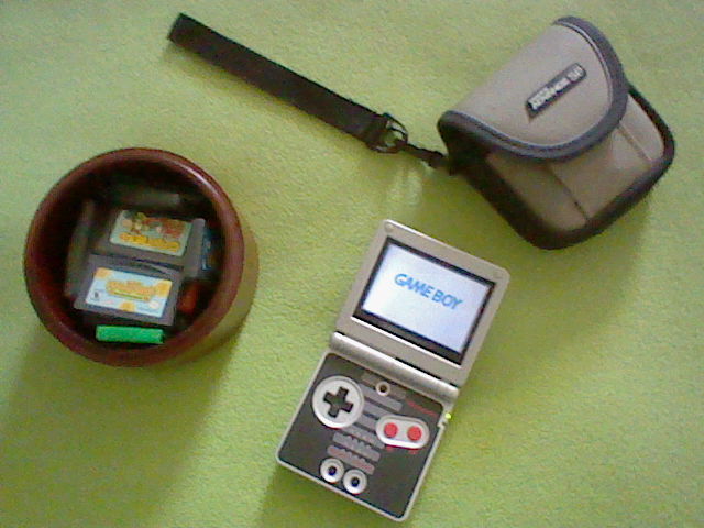 A Game Boy Advance, plus carrying case and some games