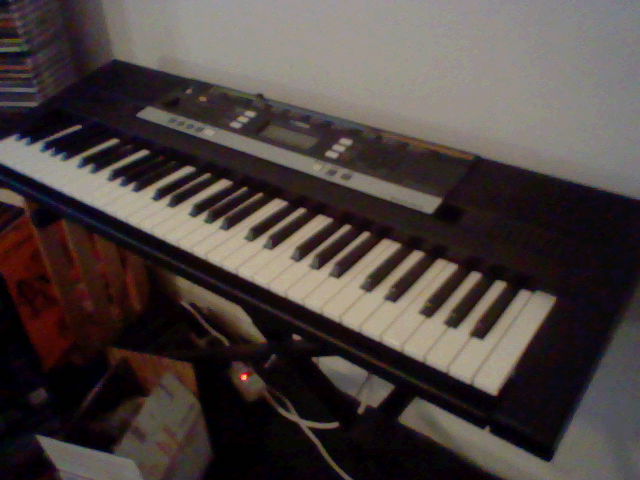 A Yamaha keyboard on a stand