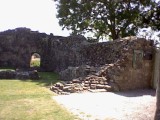 Near the entrance, with another cool pile of stone