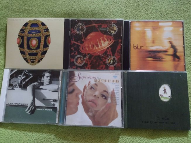 A group of six 90s and 2000s rock CDs I bought recently