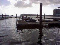 Some folks boarding a boat