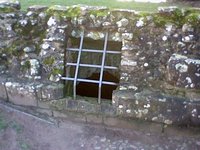 A grate protecting the tunnel below